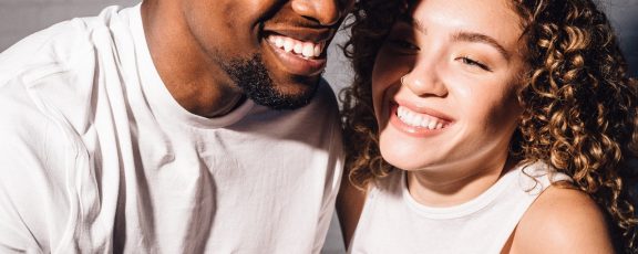 photo-of-man-and-woman-smiling-next-to-each-other-2808465